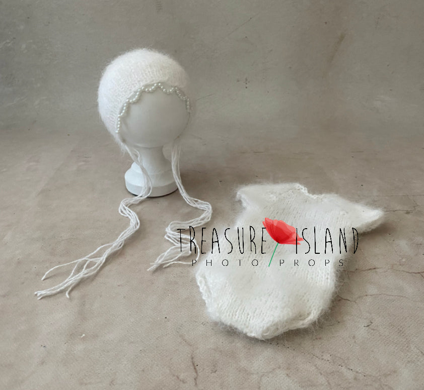 White handmade angora romper and matching bonnet set for newborn photography