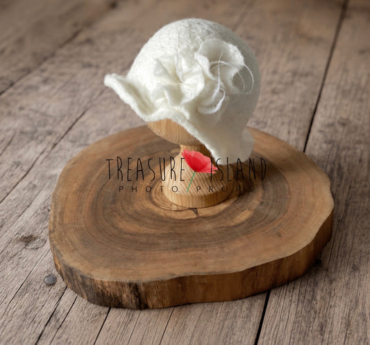 White handmade wool felted flower hat for newborn and sitter photography
