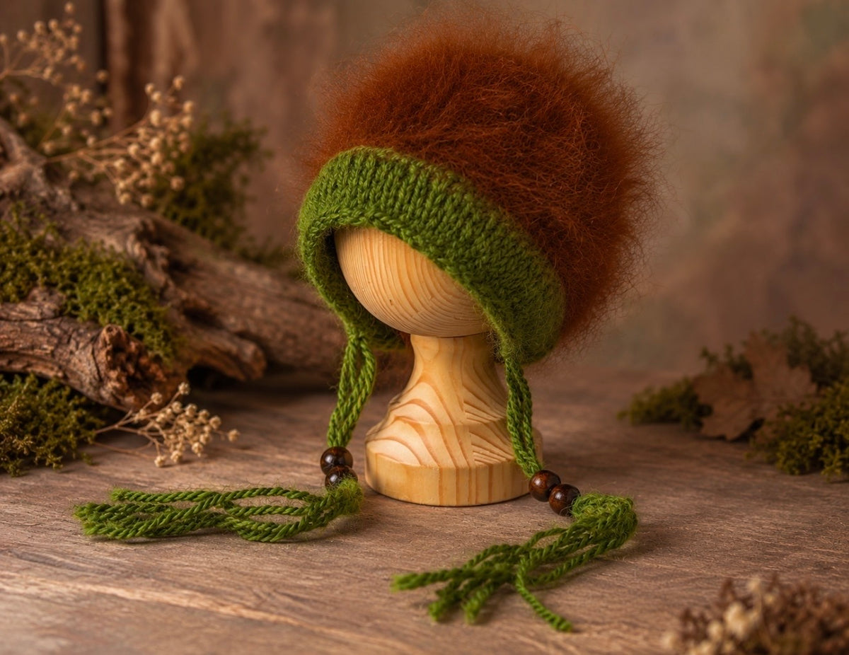 Hand-knitted woodland forest bonnet with fluffy brown alpaca-blend yarn and green wool ties