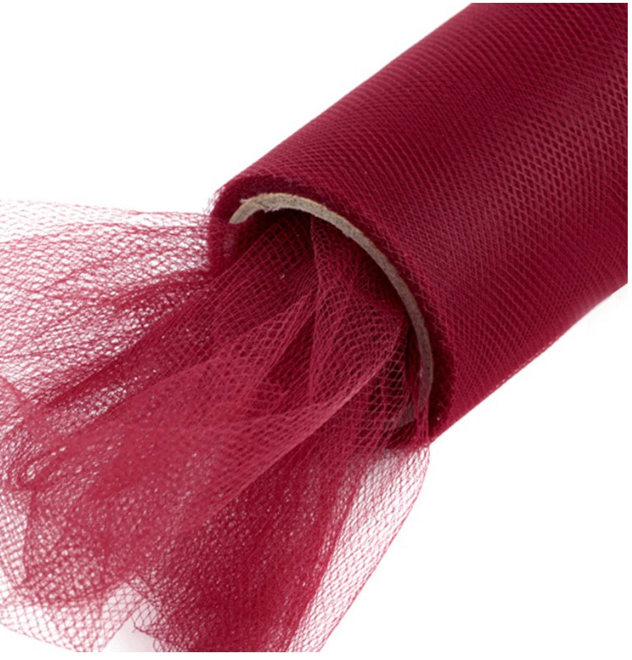 Burgundy tulle material used for handmade photography pom poms