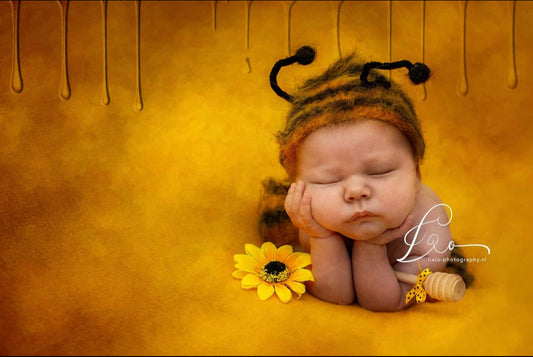 Fluffy Bee knit outfit worn in a newborn photography session