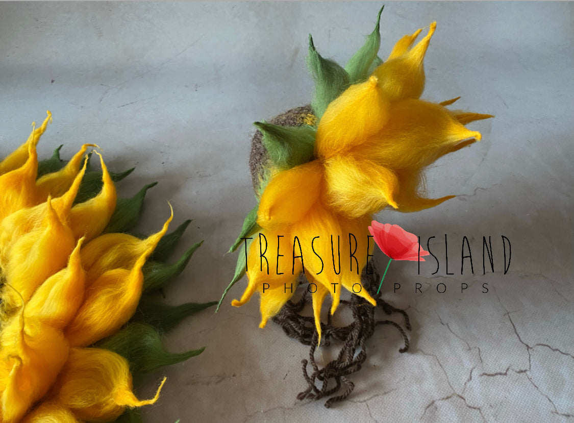 Side view of felted sunflower bonnet showing layered petal details