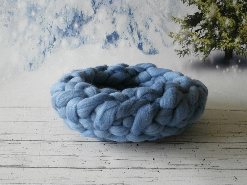Chunky wool newborn photography nest in Cornflower Breeze, hand knitted from thick wool