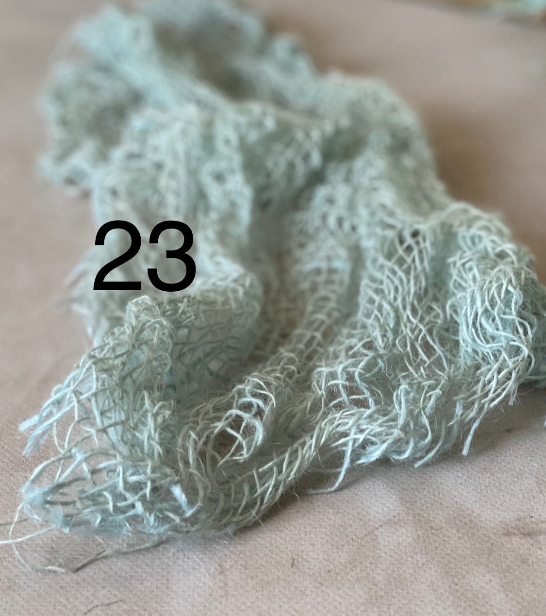 Hand-dyed textured jute photography layer in color option 23