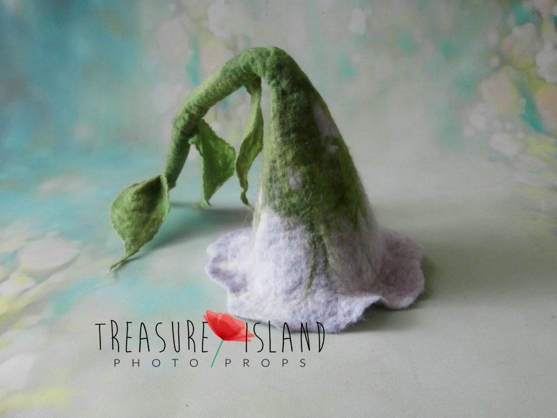 Lilac hand-felted flower hat with an elongated green stalk and leaves for newborn photography