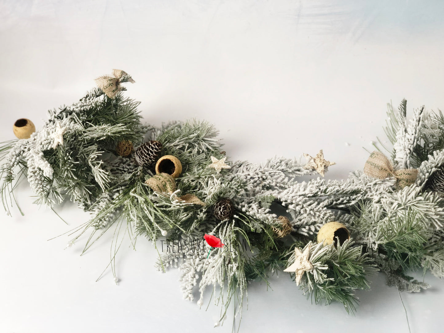 Full view of luxury snowy Christmas garland for winter and Christmas photography setups