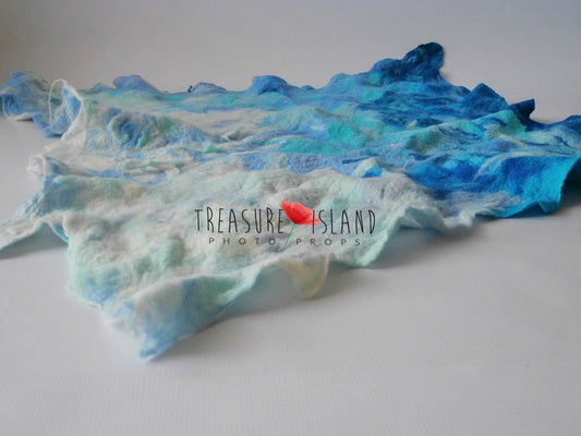 Hand-felted Ocean Wave photography blanket with sculptural blue, turquoise and seafoam wool waves