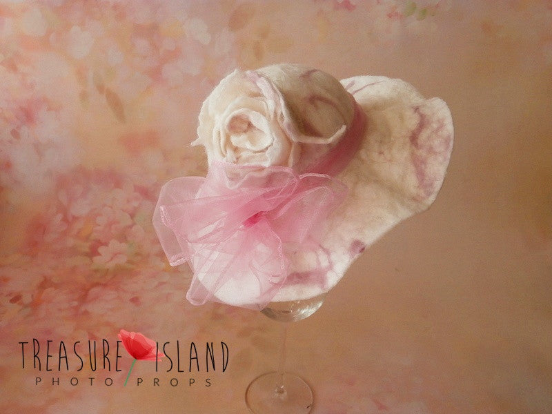 Side view of Rosalie Blush felted wool photography hat with floral decoration and pink bow