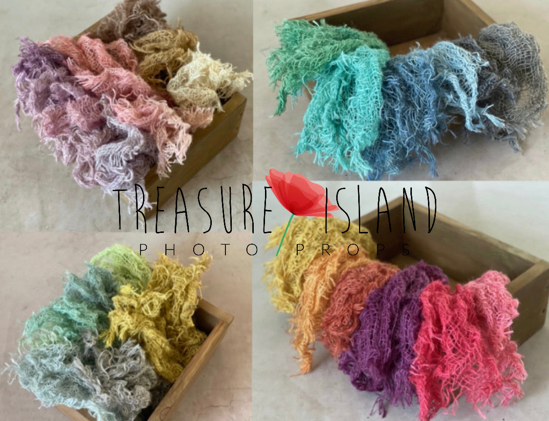 Rustic hand-dyed jute newborn photography layers displayed in a selection of coordinating colors