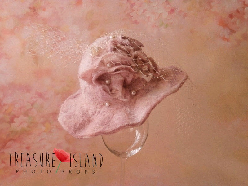 Side view of Vivienne Dusty Rose felted wool hat with layered flowers, pearls and veil