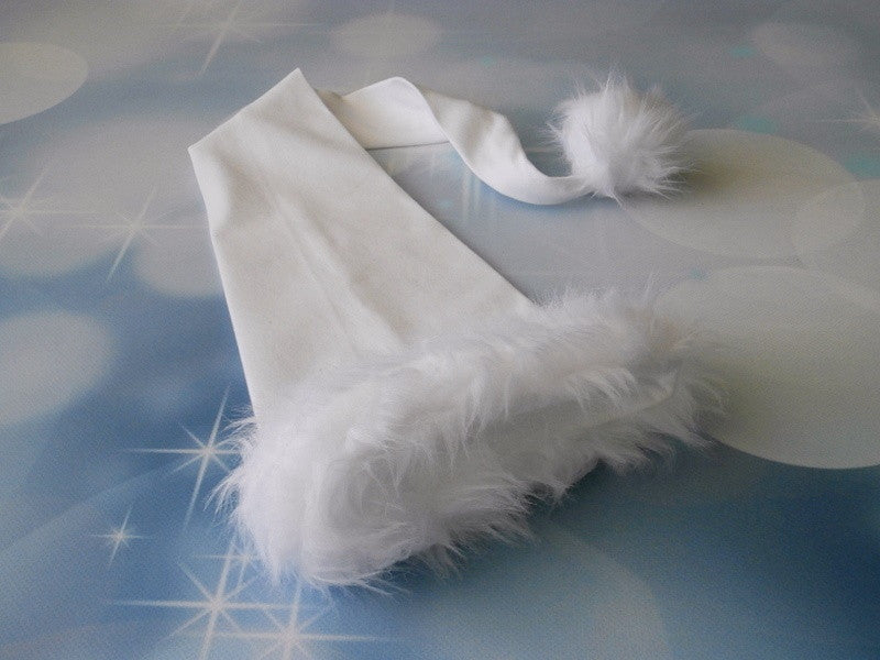 White long winter baby hat with fluffy faux fur trim and pom pom for Christmas photography